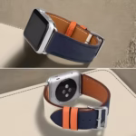 Bracelet Apple Watch EzStrap en cuir lisse au style élégant, avec boucle en métal, présenté en gros plan posé sur une surface en tissu beige.