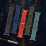 Bracelet Apple Watch EzStrap en silicone texturé de style sport, avec motif armure stylisée, présenté en cinq coloris sur un fond futuriste sombre.