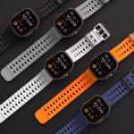 Bracelet Apple Watch EzStrap en silicone perforé, style sport, décliné en plusieurs coloris dont noir, blanc, orange et bleu, présenté à plat sur fond noir.