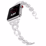 Bracelet Apple Watch EzStrap en métal brillant, style bijou à chaînes entrelacées scintillantes, présenté en gros plan sur fond blanc.