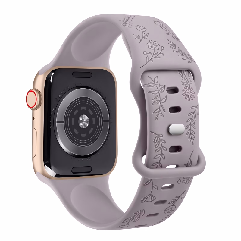Bracelet Apple Watch EzStrap en silicone mat gravé, de style élégant, avec motif floral texturé, présenté en gros plan sur fond blanc.