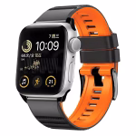 Bracelet Apple Watch EzStrap en plastique texturé noir et orange, style sport avec perforations, présenté en gros plan sur fond blanc.