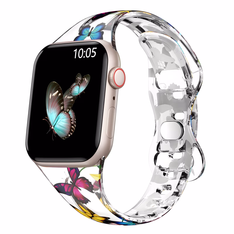 Bracelet Apple Watch EzStrap en silicone transparent, style sport, avec motif imprimé de papillons colorés, présenté en gros plan sur fond blanc.