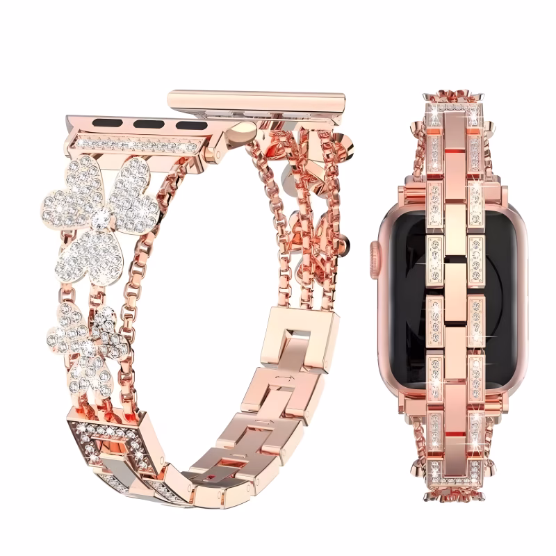 Bracelet Apple Watch EzStrap en métal rose gold au style luxe, orné de chaînettes doubles et de fleurs serties de cristaux, présenté en gros plan sur fond blanc.