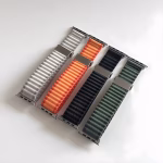 Bracelet Apple Watch EzStrap en nylon tissé de style sport avec boucle métallique, design ondulé, présenté en cinq coloris posés à plat sur une surface blanche.