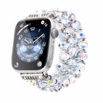 Bracelet Apple Watch EzStrap en métal avec perles cristallines scintillantes et chaîne entrelacée, de style élégant et premium, présenté en gros plan sur fond blanc.