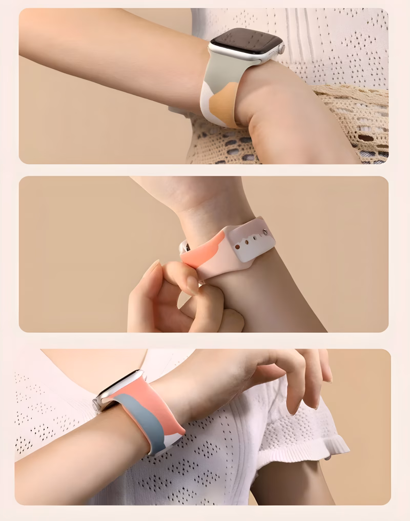 Bracelet Apple Watch EzStrap en silicone mat à design artistique abstrait, de style sport, porté au poignet d’une femme en haut blanc brodé.