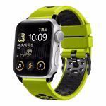 Bracelet Apple Watch EzStrap en silicone perforé de style sport, bicolore vert fluo et noir, présenté en gros plan sans poignet.